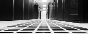 Data center with raised floor and access floor high flow tiles with server racks