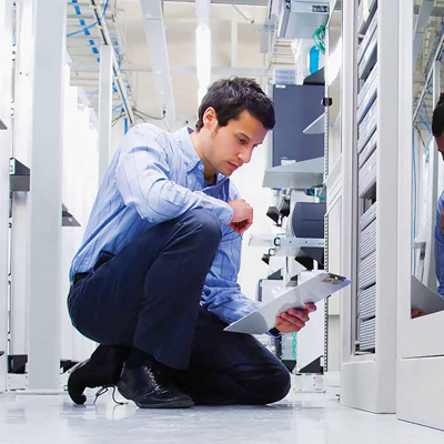 data center professional reviewing clipboard