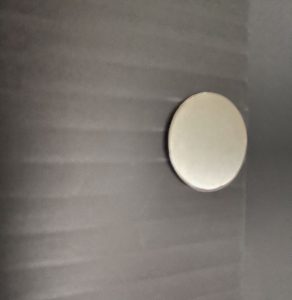 Black blanking panel with silver metal magnetic clip