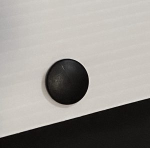 White blanking panel with black clip